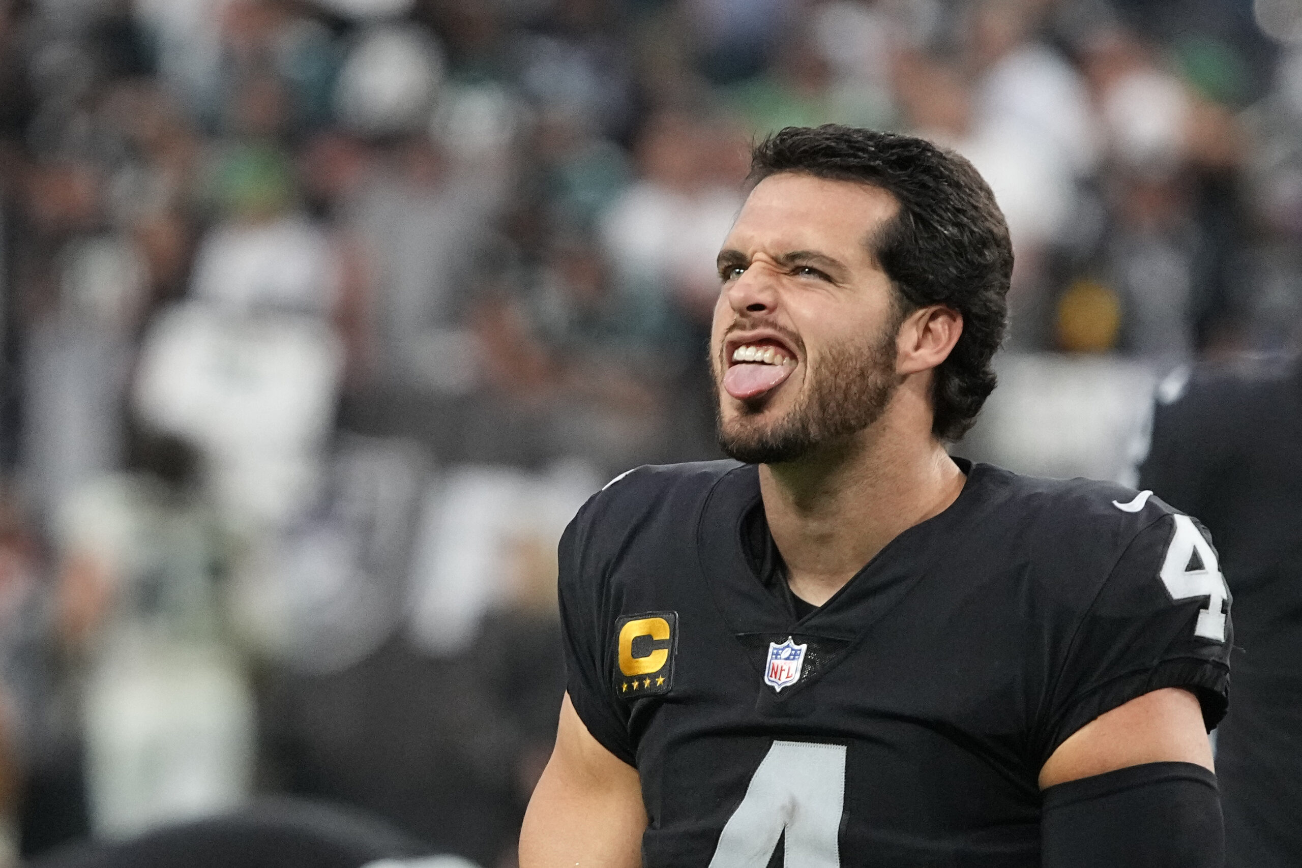 Las Vegas Raiders quarterback Derek Carr (4) celebrates as he walks off the field after the Las Vegas Raiders defeated the Philadelphia Eagles in an NFL football game, Sunday, Oct. 24, 2021, in Las Vegas. (AP Photo/Rick Scuteri)